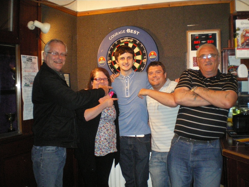 Kieran being congratulated by Dan and Dawn, the Landlord and Landlady at the Sportsman