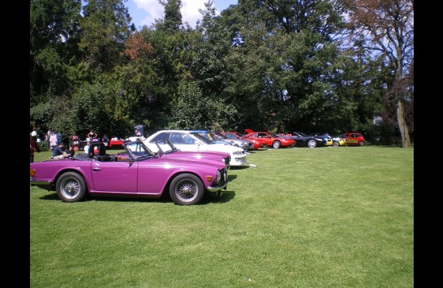 More cars glinting in the sun at the Abbots Barton